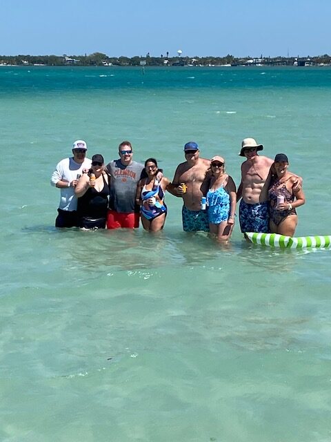 Upscale tiki charter cruising Sarasota Bay waterfront